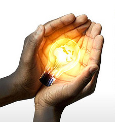 lightbulb in hands